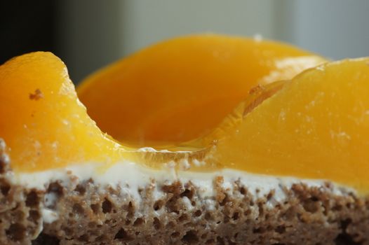 the chocolate biscuit with a peach close up