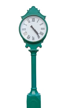 Old public green clock isolated on white background