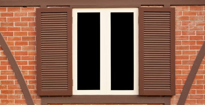 close-up single wood old window in brick wall