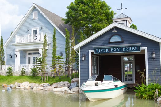 Boatshed on the River in blue house