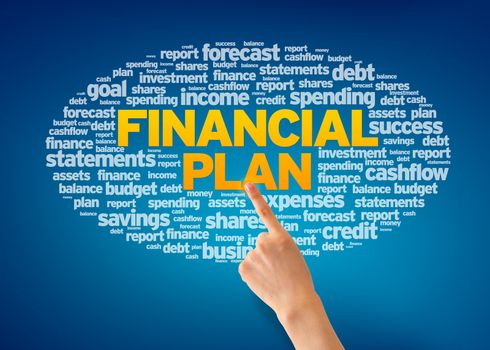 Hand pointing at a Financial Plan Word Cloud on blue background.