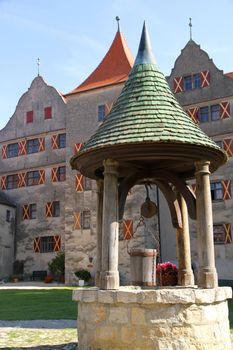 A fountain in the Castle Harburg in Bavaria, Germany, Europe.