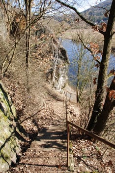 Narrow stair path leads through the wild rock