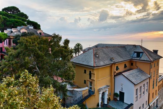 Sunset Sea and Houses in Resort of Camogli near Genoa in Italy
