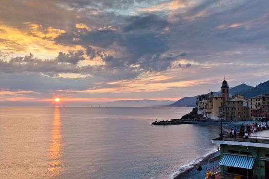 Dramatic Sunset on the Pebble Beach of Camogli near Genoa, Italy