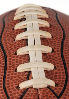 Detail of a ball for american football isolated. With shallow DOF