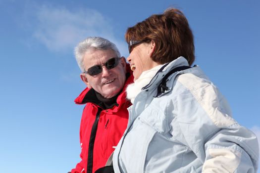 Mature couple in winter coats