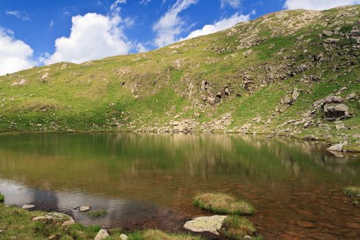 summer view of Lusia lake, in val di Fassa, Italian dolomites