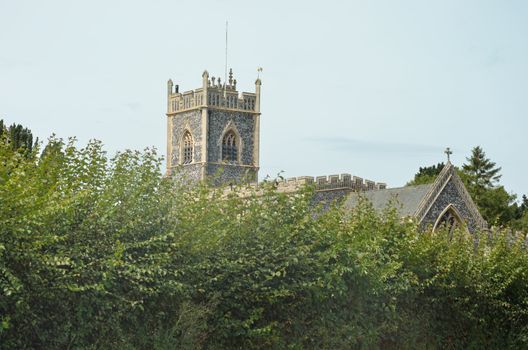 English Parish Church through trees