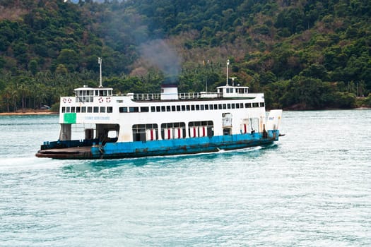 Ferry boats going into the harbor. To get a lot of people. at  Koh Chang in Thailand.