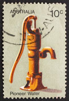 AUSTRALIA - CIRCA 1972: a stamp printed in the Australia shows Water Pump, Australian Pioneer Life, circa 1972