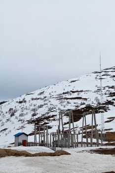 Power plant station in mountain with snow