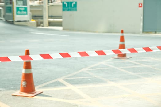 Red tape cross over on road ,no entry