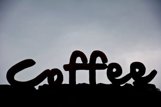 silhouette of coffee letter