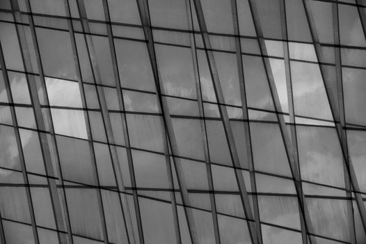 Modern building facade glass panel abstract double exposure. Black and white.