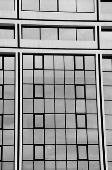 Glass facade squares modern building architectural detail. Black and white.