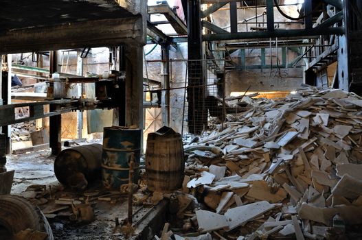 Abandoned marble processing factory interior. Industrial decay.