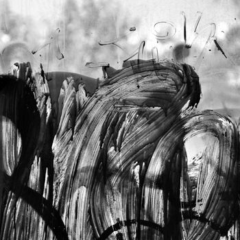 Smudged paint on glass abstract background. Black and white.