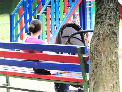 People with children resting in the park