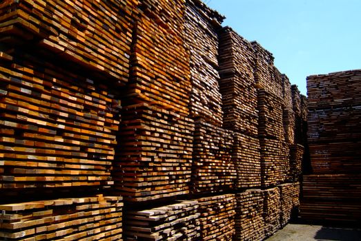 stack of lumber with the background