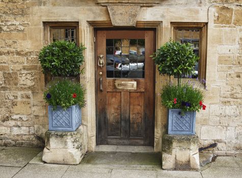 Beautiful picturesque cottage entrance in the village of Chipping Campden, Cotswold, United Kingdom.