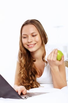 Portrait of a young woman with notebook