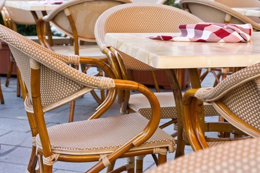 Chaires and tables on terrace in summer