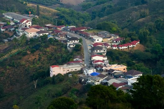 Village on mountain in thailand in morning time