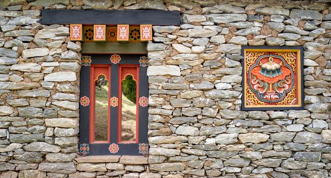 Window and logo of korea style in stone wall