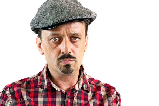 Closeup portrait of a young man man wearing a cap, isolated on white background