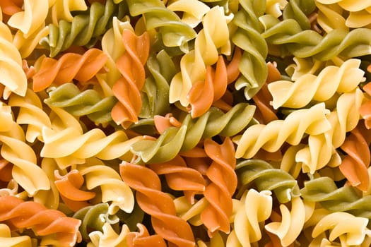 Raw italian pasta isolated on white background