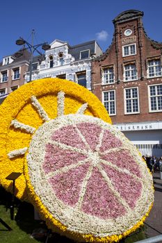 HAARLEM, THE NETHERLANDS - APRIL 21 2013: Fruit with flowers at flower parade on April 21 2013 in Haarlem, The Netherlands. The annual flower parade is a unique event with one million visitors. 
