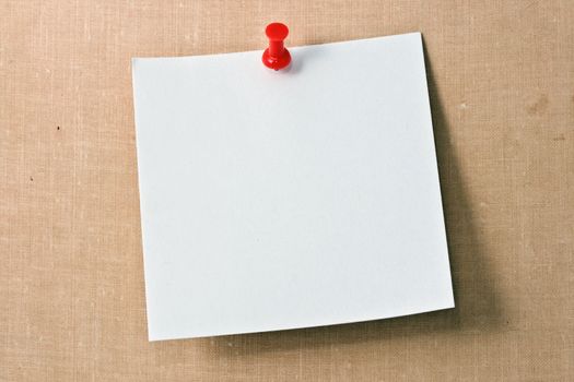 Note white paper tacked on a wall