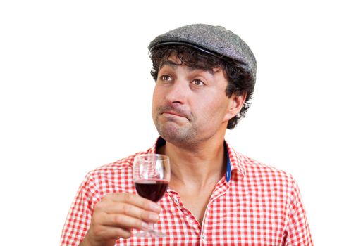 Portrait of a French man tasting a glass of red wine, isolated on white background