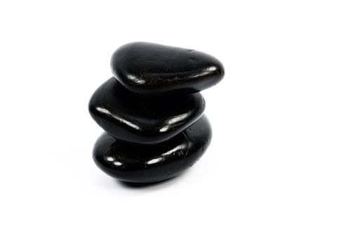 black pebble on white background