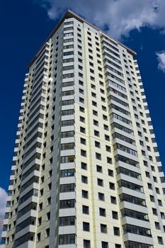 Modern apartment building under blue sky