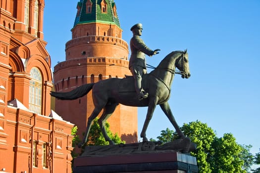 Statue of marshal Zhukov with History and Kremlin tower, Moscow, Russia