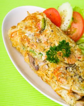 omelette with seafood, tasty omelette with seafood and mushroom