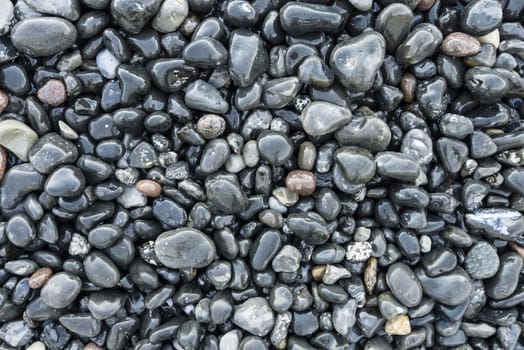 Pebbles of different colors on the beach