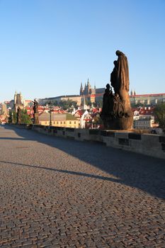 View of St. Vitus Cathedral from Charles Bridge at dawn, Prague,Czech Republic