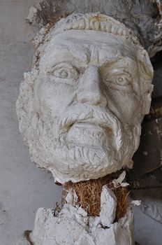 ATHENS - FEBRUARY 3: Plaster sculpture ancient god Zeus broken statue head in the abandoned studio of sculptor Nikolaos Pavlopoulos in Athens Greece, February 3, 2012.