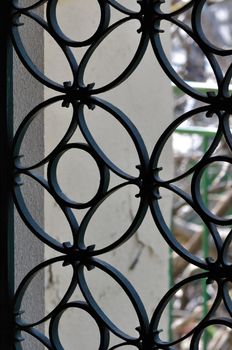 Vintage metal door frame with decorative circles pattern. Abstract background.