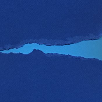 Torn blue paper background resembling flowing river. Grunge design element.