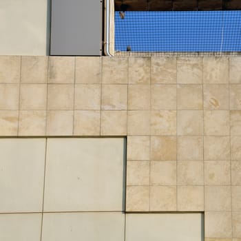 Wall and sky architectural background. Modern building facade detail.