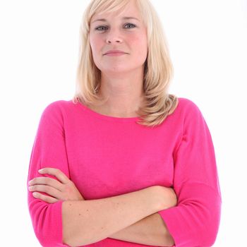 Studio shot of attractive woman with arms folded islated on white 