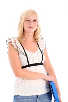 Pretty young blonde female student or office worker dressed in smart casual clothing holding a blue file under her arm 