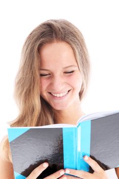 Smiling teenager with a lovley wide smile reading a book which she is handholding isolated on white 