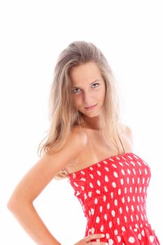 Studio shot of beautiful young woman in red dress isolated on white 