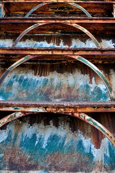 Old rusty iron staircase and chipped paint abstract background.