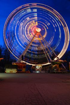 One of the crazy festival ferris wheels in Prague. Beautiful neon light show.